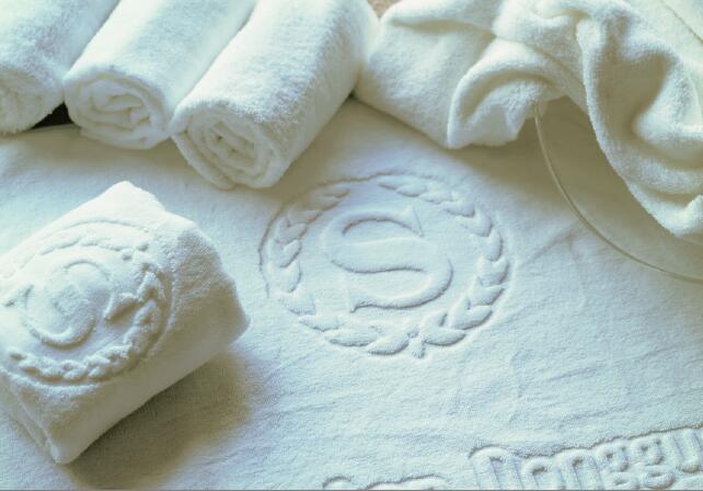 Hotel towel with Jacquard logo